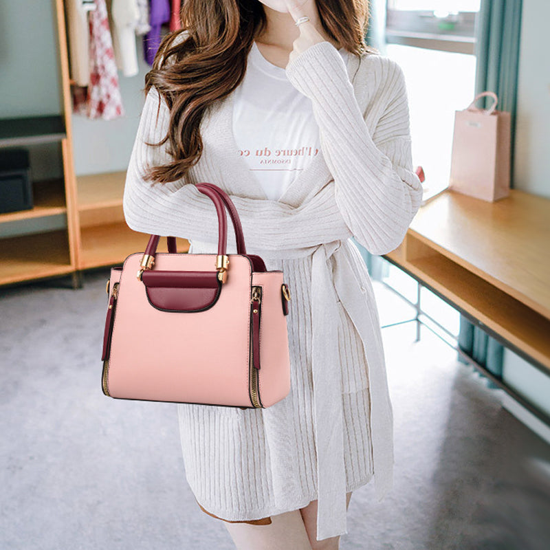 Donna con cardigan bianco e borsa a mano rosa e bordeaux, moda autunnale, accessori eleganti, stile casual chic, tendenze 2023.