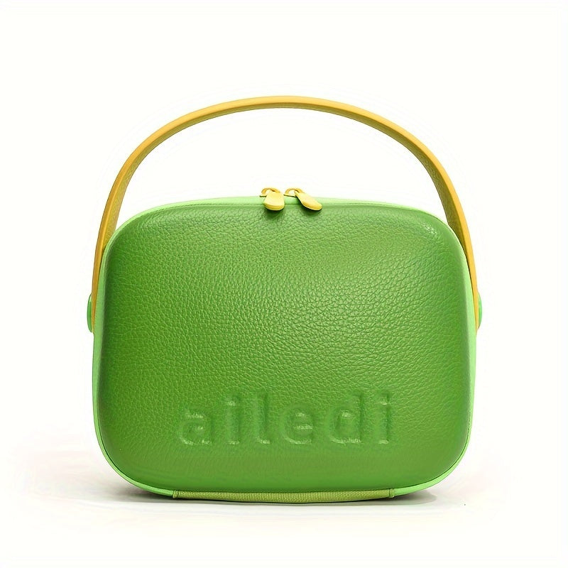 Borsa a tracolla verde in pelle con manico giallo, design moderno, chiusura a zip, marchio "ailedi". Accessorio moda donna elegante e versatile.