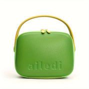 Borsa a tracolla verde in pelle con manico giallo, design moderno, chiusura a zip, marchio "ailedi". Accessorio moda donna elegante e versatile.