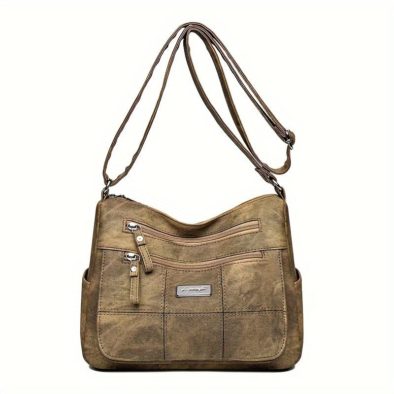 Borsa a tracolla in pelle marrone con tasche multiple e cerniere, design elegante e pratico, ideale per donna, moda accessori, shopping online.