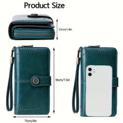 Portafoglio donna in pelle verde con cerniera, cinturino da polso e chiusura a bottone, dimensioni 19x11x3,5 cm, compatibile con smartphone.