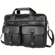 Borsa ventiquattrore in pelle nera con tracolla regolabile, doppie tasche frontali con fibbie, ideale per lavoro e ufficio.