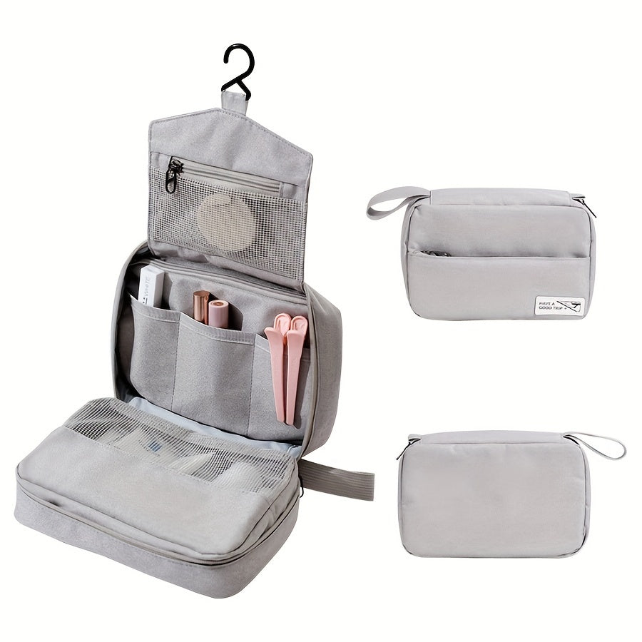 Borsa da toilette grigia con gancio, tasche multiple e chiusura a zip, ideale per viaggi. Organizzatore cosmetici compatto e resistente all'acqua.