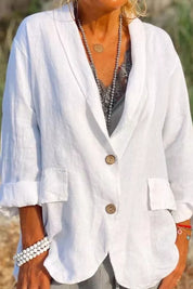 Giacca donna in lino bianco, maniche lunghe, bottoni in legno, tasche frontali, stile casual elegante, perfetta per primavera estate.