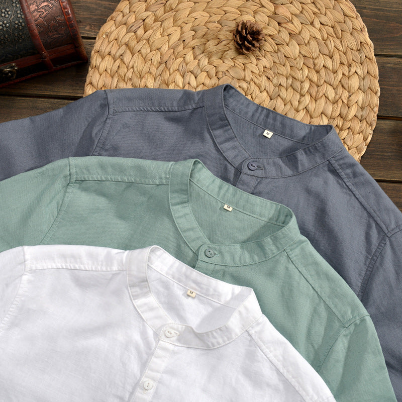 Camicie di lino uomo in tre colori: bianco, verde, blu. Collo alla coreana, stile casual, perfette per moda estiva. Tessuto leggero e traspirante.