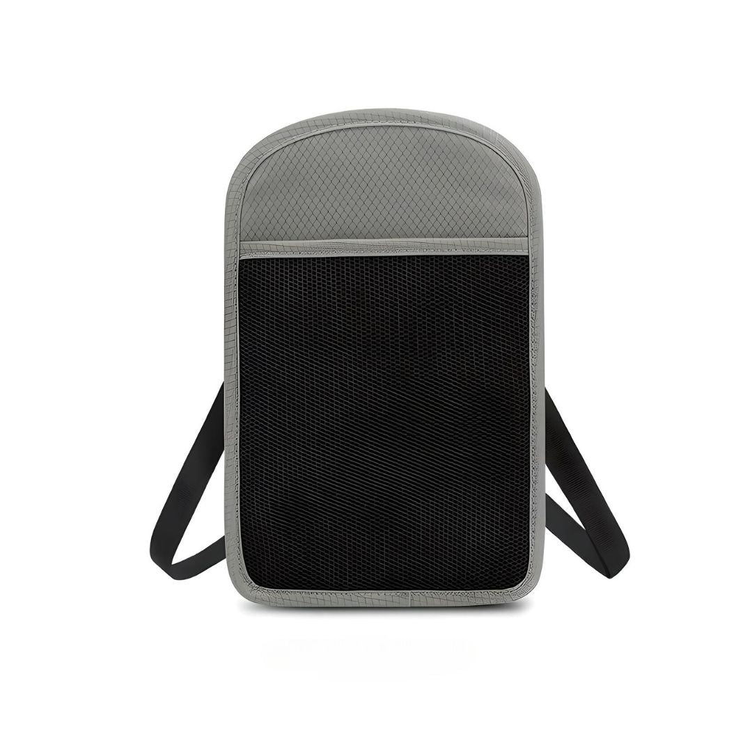 Zaino antifurto grigio e nero, design minimalista, tasca frontale in rete, spallacci regolabili, ideale per viaggi e uso quotidiano.