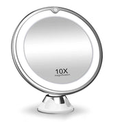 Specchio cosmetico ingrandimento 10x, rotondo, con luce LED, montatura argento, base stabile, ideale per trucco e cura del viso.