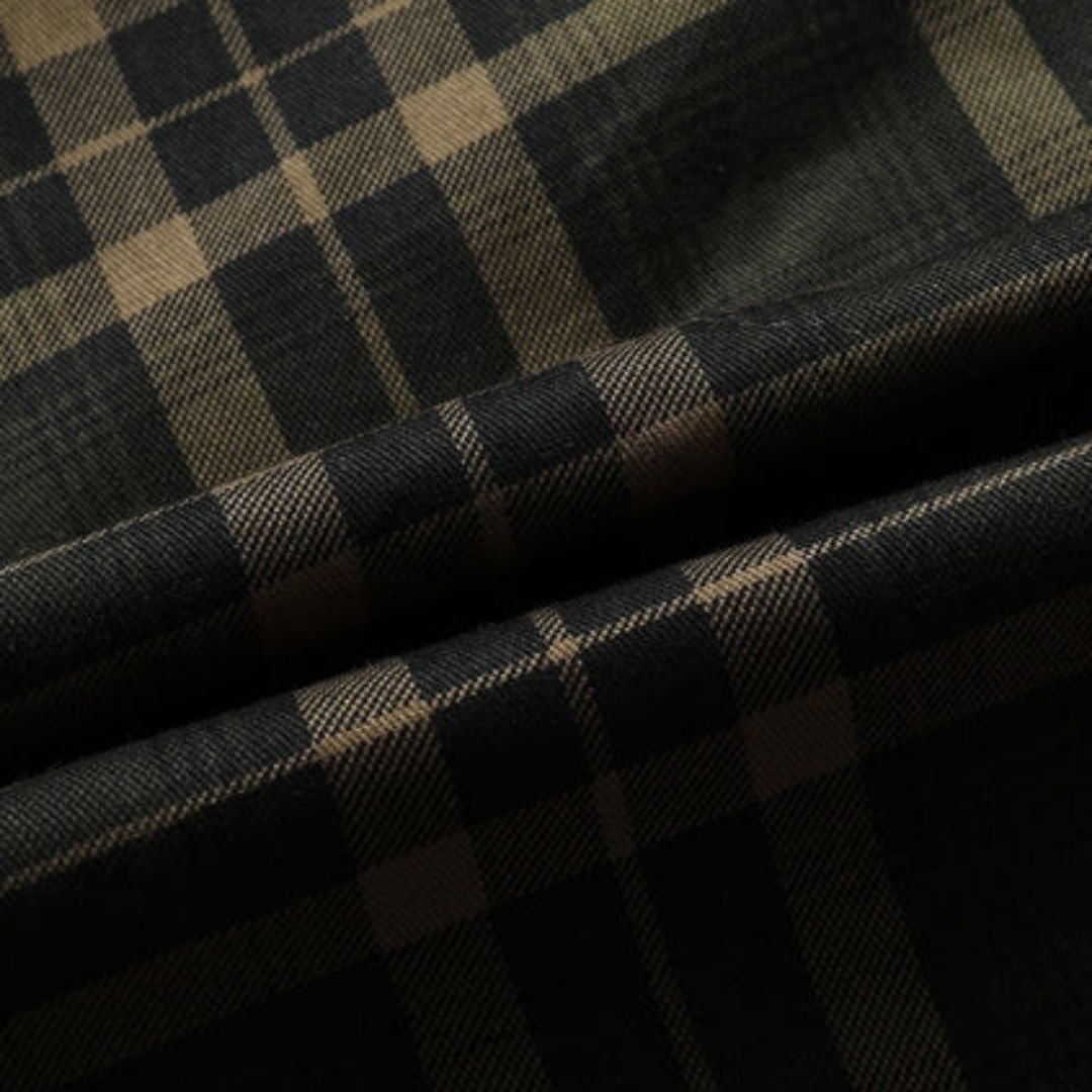 Tessuto scozzese nero e beige, motivo a quadri, ideale per abbigliamento moda, sartoria, alta qualità, stile classico ed elegante.
