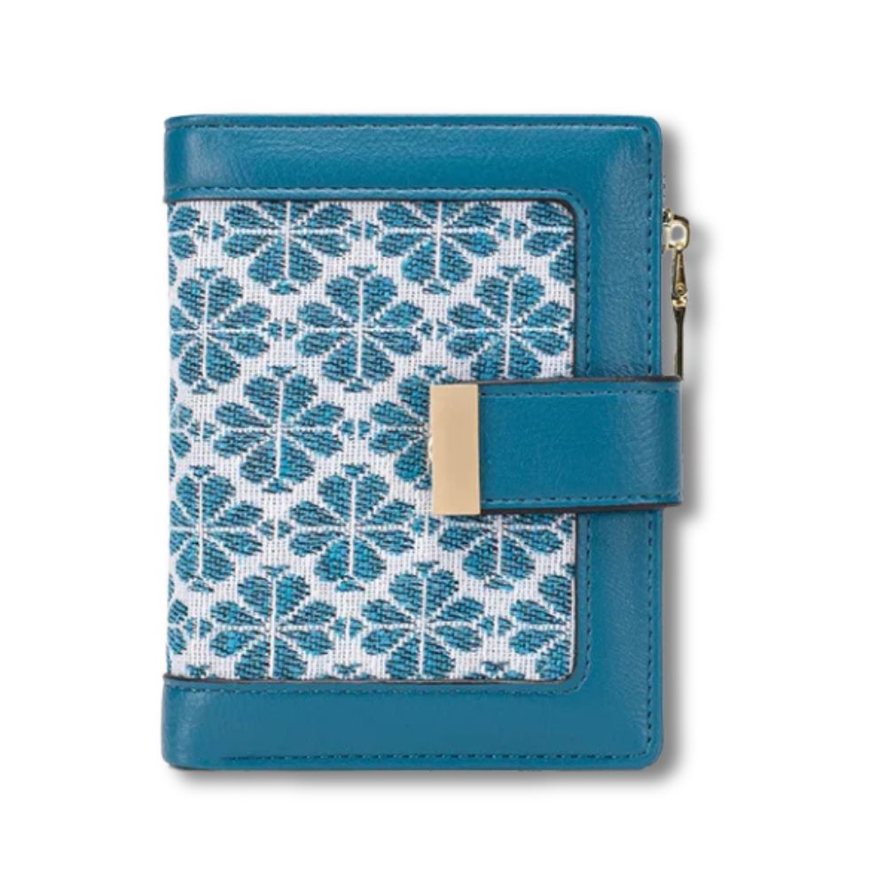 Portafoglio donna in pelle blu con motivo geometrico, chiusura a scatto dorata. Design elegante e moderno, accessorio moda di tendenza.