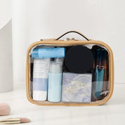 Borsa trasparente da viaggio con prodotti cosmetici, ideale per organizzare trucchi e articoli da toeletta. Perfetta per viaggi e uso quotidiano.