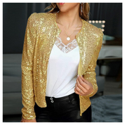 Giacca donna paillettes oro, elegante e scintillante, abbinata a top bianco e pantaloni neri. Perfetta per serate glamour e moda femminile.