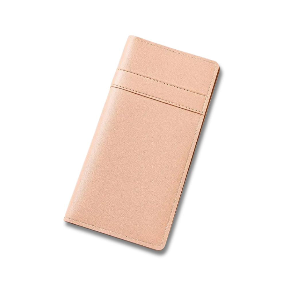 Portafoglio donna in pelle rosa chiaro, design elegante e sottile, ideale per carte e contanti. Accessorio moda femminile di alta qualità.