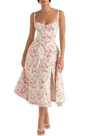 Abito midi floreale bianco e rosa con spalline sottili, scollo a cuore e spacco frontale. Perfetto per eventi estivi eleganti e cerimonie.