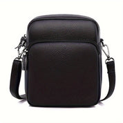 Borsa a tracolla in pelle nera da uomo, design elegante e compatto, con tasca frontale e chiusura a zip, ideale per uso quotidiano e viaggi.