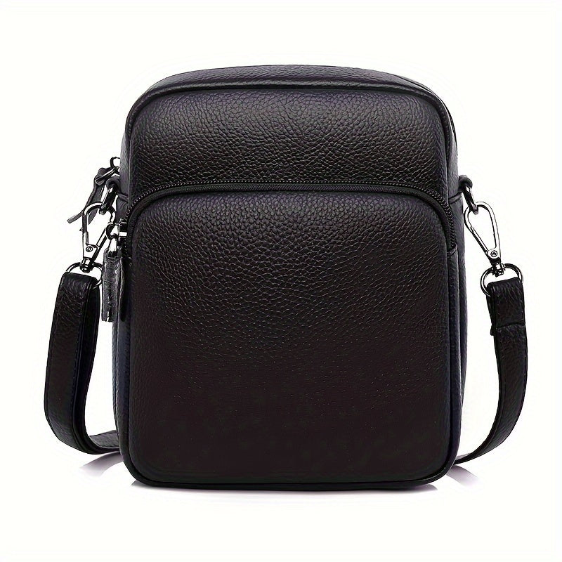 Borsa a tracolla in pelle nera da uomo, design elegante e compatto, con tasca frontale e chiusura a zip, ideale per uso quotidiano e viaggi.