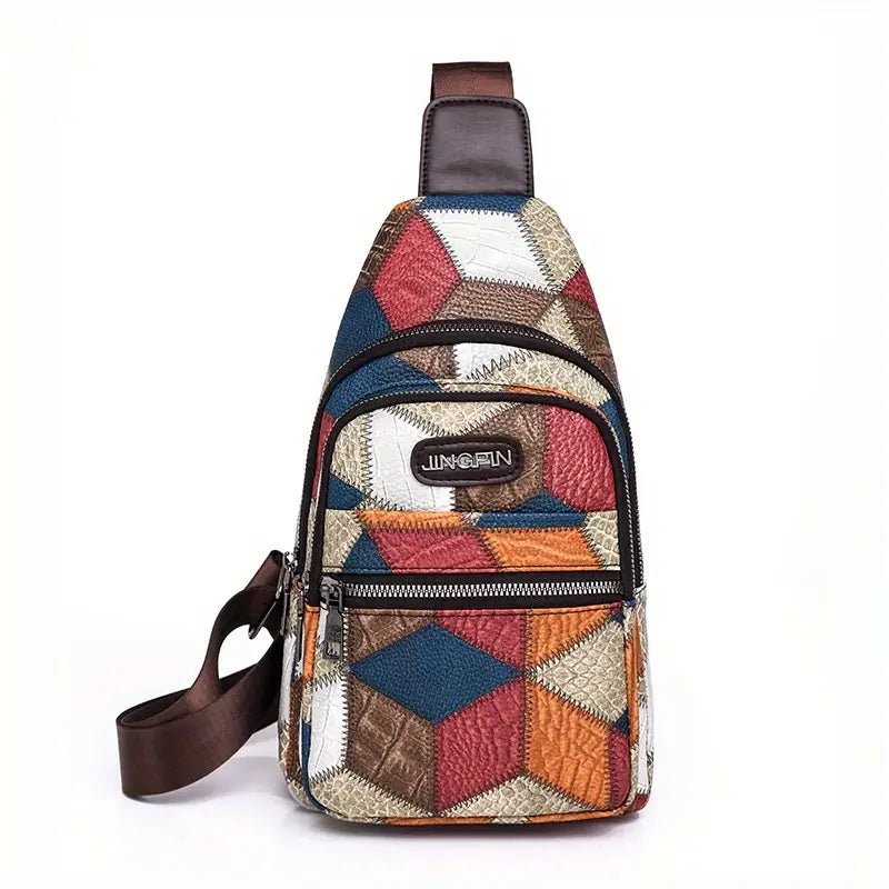 Zaino a tracolla multicolore in pelle patchwork, design geometrico, con cerniere e cinturino regolabile marrone. Accessorio moda unisex.