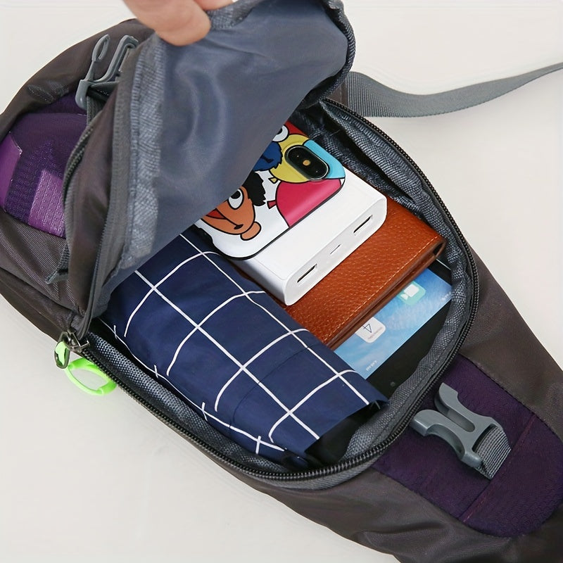 Zaino compatto aperto con power bank, smartphone, portafoglio e ombrello pieghevole. Accessori viaggio, organizzazione bagaglio, praticità.