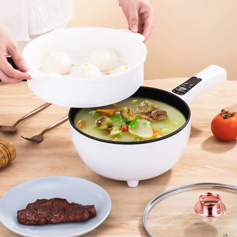 Padella elettrica bianca multifunzione con coperchio, zuppa di verdure e carne, vassoio per cottura a vapore, cucina moderna, accessori da tavola.