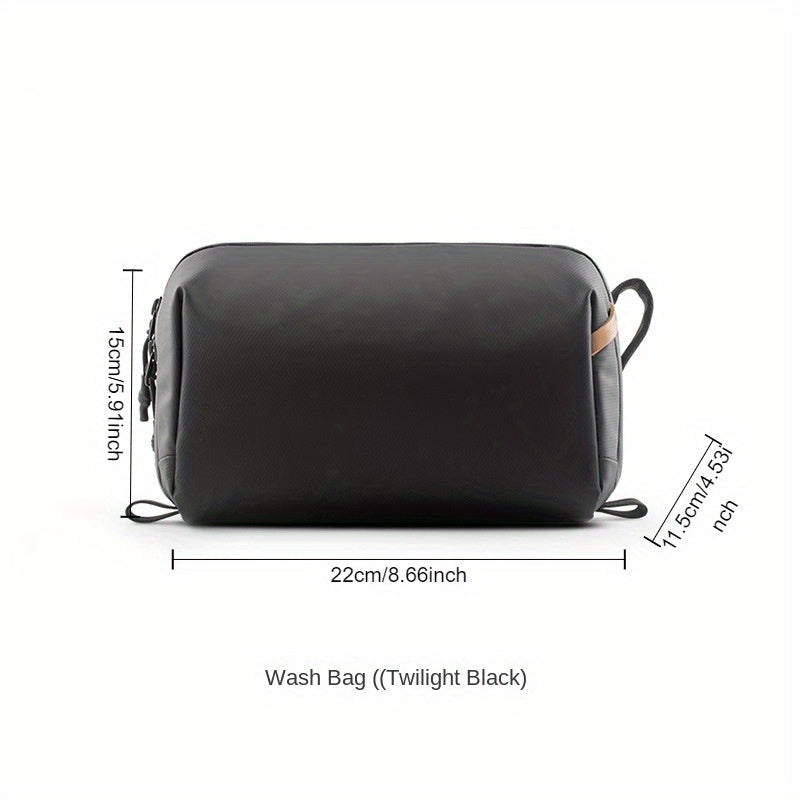 Borsa da toilette nera, dimensioni 22x15x11,5 cm, con cerniera e manici laterali. Ideale per viaggi, resistente e compatta.