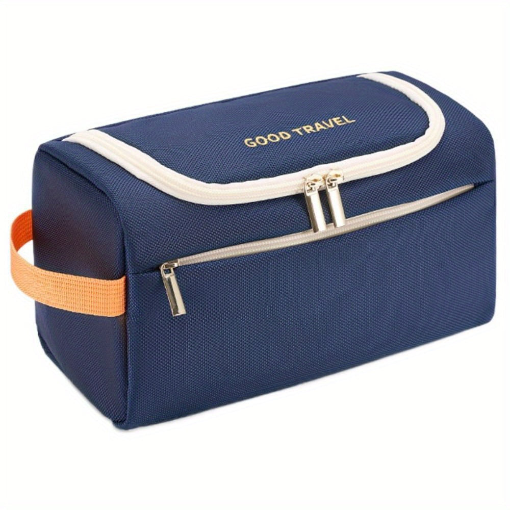 Borsa da viaggio blu con cerniera, manico arancione, tasca frontale, ideale per organizzare accessori da viaggio.