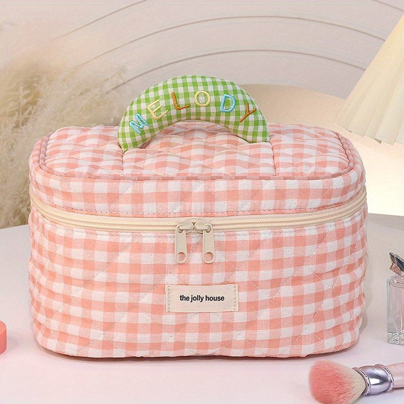 Borsa cosmetica a quadretti rosa con manico imbottito "Melody", cerniera bianca, ideale per trucco e accessori, design elegante e pratico.