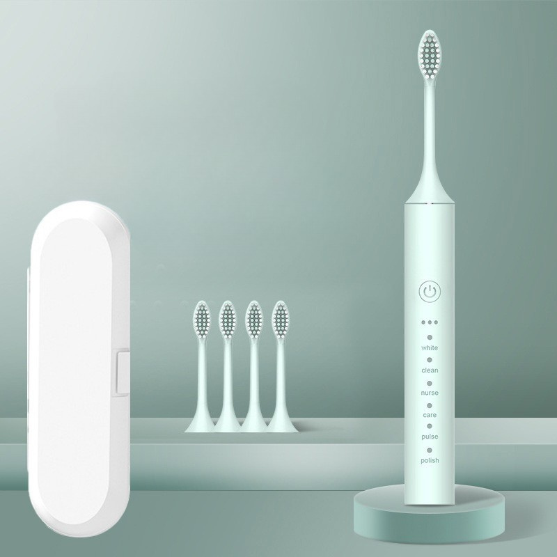 Spazzolino elettrico bianco con custodia e quattro testine di ricambio, design moderno, modalità multiple, ideale per igiene orale avanzata.