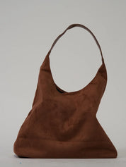 Borsa a spalla in pelle scamosciata marrone, design minimalista, manico singolo, ideale per moda donna, accessorio elegante e versatile.