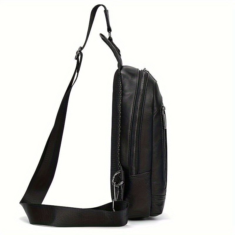 Zaino in pelle nera con tracolla regolabile, design elegante e moderno, ideale per lavoro e viaggio. Tasche multiple con cerniera.