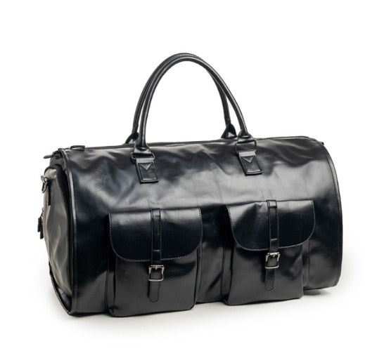 Borsone da viaggio in pelle nera con doppie tasche frontali e manici robusti. Elegante e spazioso, ideale per viaggi e uso quotidiano.