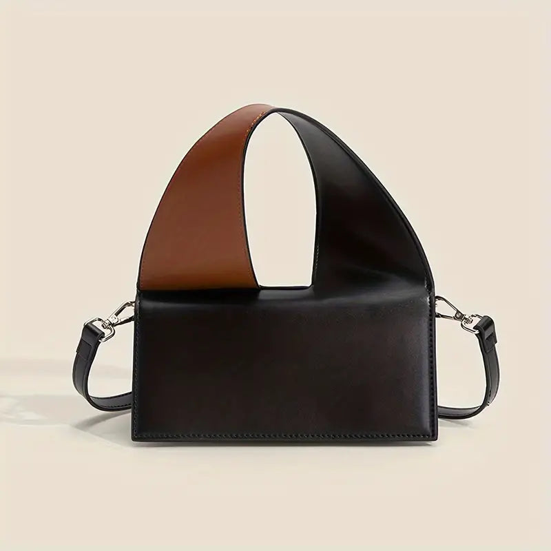 Borsa a tracolla in pelle nera e marrone, design moderno, chiusura magnetica, accessorio moda donna elegante, perfetta per ogni occasione.