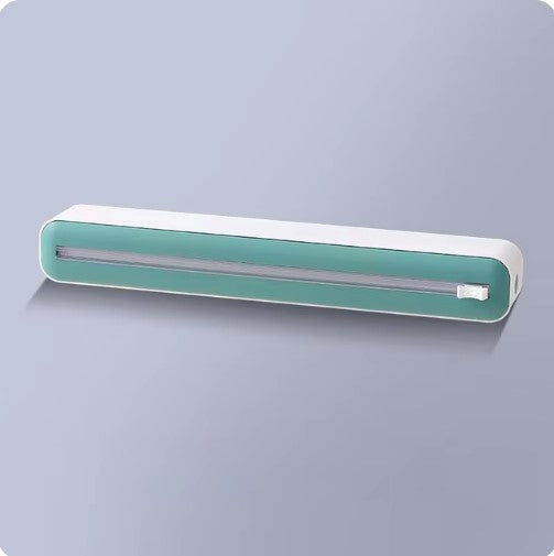 Sigillatore sottovuoto portatile verde e bianco, design compatto, ideale per conservare alimenti freschi. Accessorio cucina essenziale.