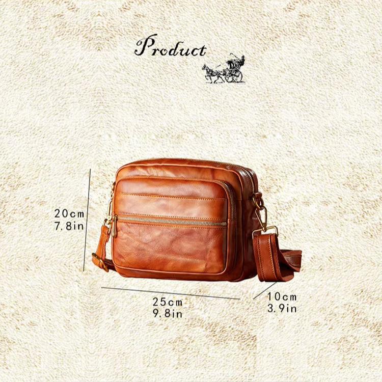 Borsa a tracolla in pelle marrone, dimensioni 25x20x10 cm, con cerniera e tasche multiple. Elegante e pratica per uso quotidiano.