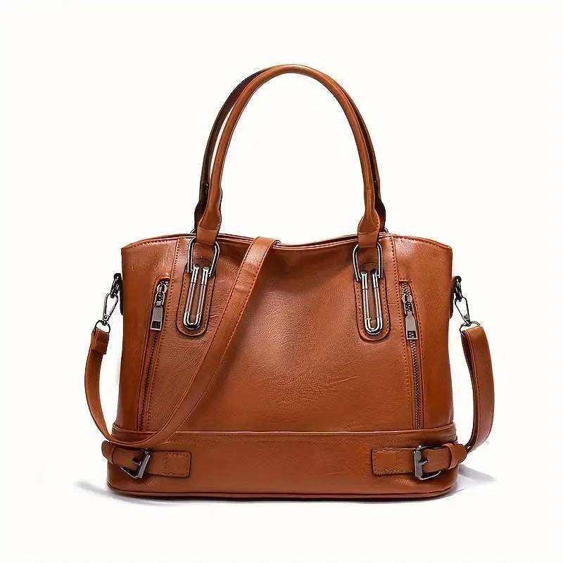 Borsa a mano in pelle marrone con doppio manico, tracolla regolabile e tasche con zip. Elegante accessorio moda donna.