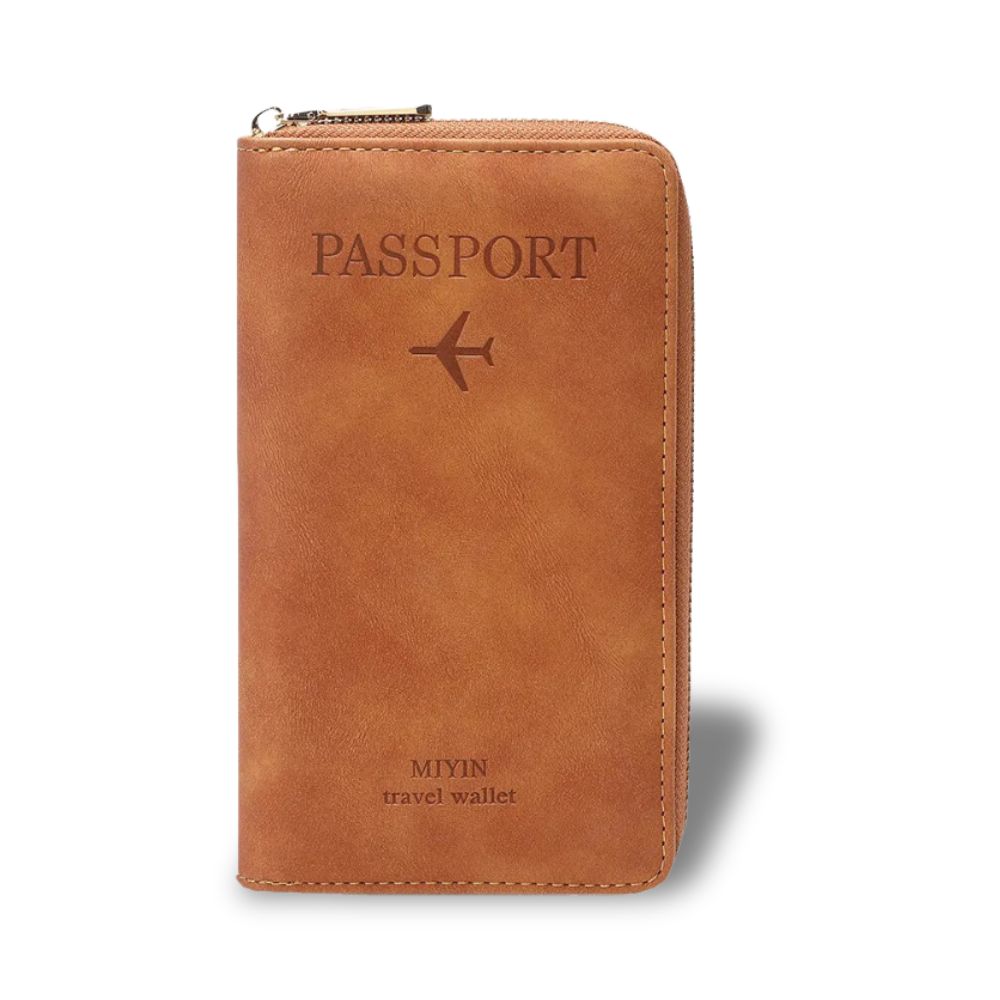 Portafoglio da viaggio in pelle marrone con cerniera, design per passaporto, logo aereo inciso, ideale per viaggiatori.