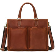 Borsa a tracolla in pelle marrone con doppio manico, tasche frontali e tracolla regolabile. Elegante e funzionale per lavoro e viaggio.