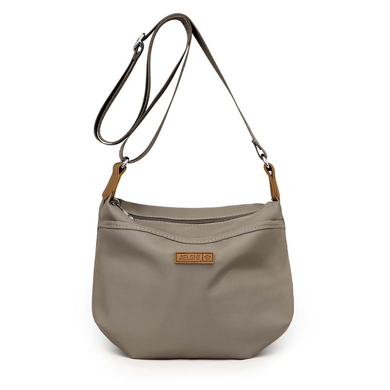 Borsa a tracolla grigia in pelle sintetica, design minimalista, con cinghia regolabile e dettagli in metallo. Perfetta per uso quotidiano e moda casual.