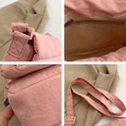 Zaino in tessuto rosa con dettagli beige, tasca interna con zip, spallacci regolabili. Design moderno e funzionale per uso quotidiano.