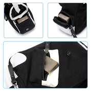 Zaino nero con dettagli bianchi, tasche multiple con zip, design moderno, ideale per scuola o viaggio. Tasche sicure per oggetti personali.