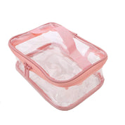 Borsa trasparente in PVC con cerniera rosa, ideale per viaggi, organizzazione cosmetici, resistente all'acqua, dimensioni compatte.