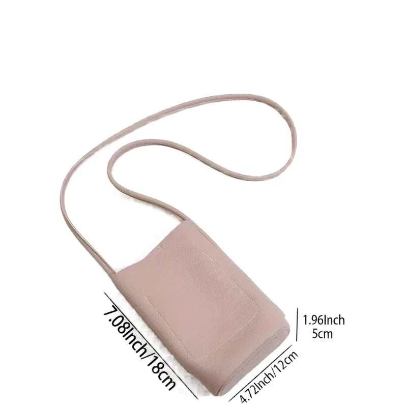 Borsa a tracolla rosa chiaro in pelle, dimensioni 18x12x5 cm, design minimalista, ideale per smartphone, accessorio moda donna elegante.