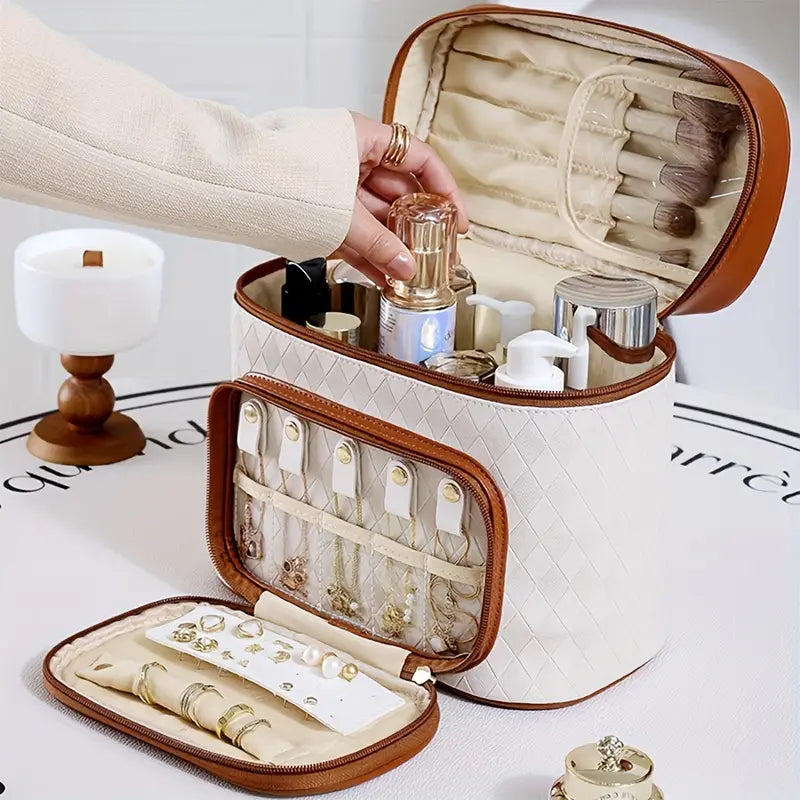 Scatola porta trucchi in pelle bianca con cerniera, scomparti per cosmetici e pennelli, design elegante, ideale per organizzare il make-up.