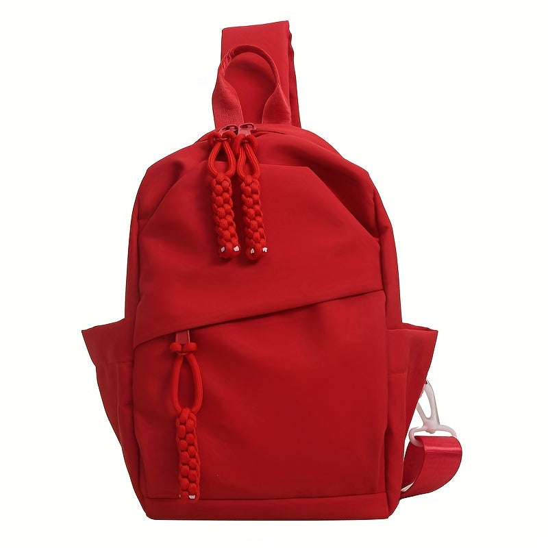 Zaino a tracolla rosso unisex, design moderno, con tasche multiple e chiusura a zip. Ideale per scuola, lavoro, viaggi. Accessorio moda versatile.