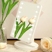 Specchio cosmetico LED con fiori di tulipano, design elegante, base bianca, ideale per trucco e decorazione, illuminazione regolabile, moderno.