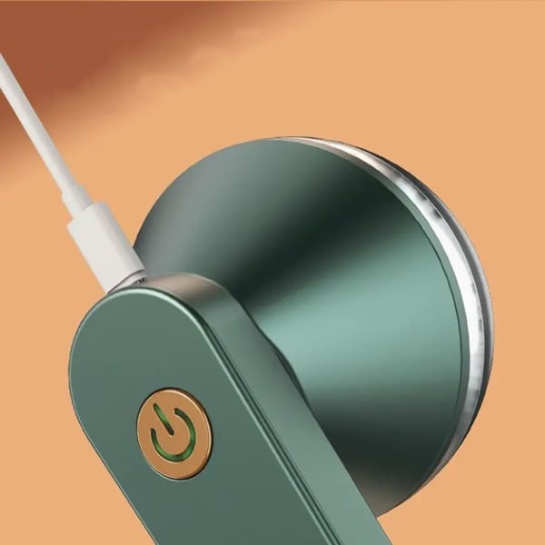 Lampada da scrivania LED verde con porta USB, design moderno, interruttore touch, illuminazione regolabile, ideale per ufficio e studio.