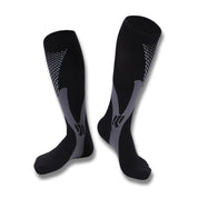 Calze a compressione nere e grigie, design ergonomico, ideali per sport e viaggi. Materiale traspirante, supporto muscolare, taglia unica.