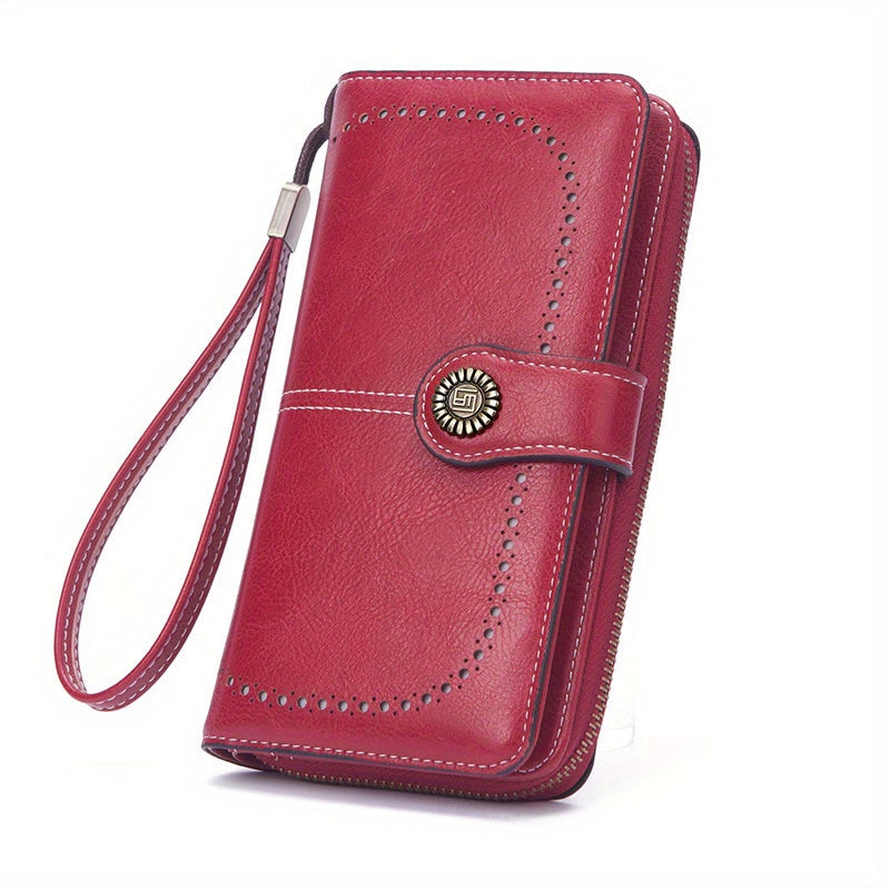 Portafoglio donna in pelle rossa con cinturino, design elegante, chiusura a bottone, cuciture decorative, ideale per moda e accessori femminili.