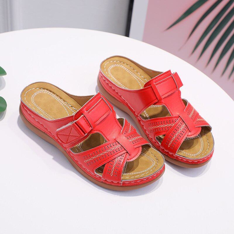 Sandali rossi da donna in pelle, design intrecciato, suola comoda, chiusura a strappo, ideali per l'estate. Scarpe casual eleganti e versatili.