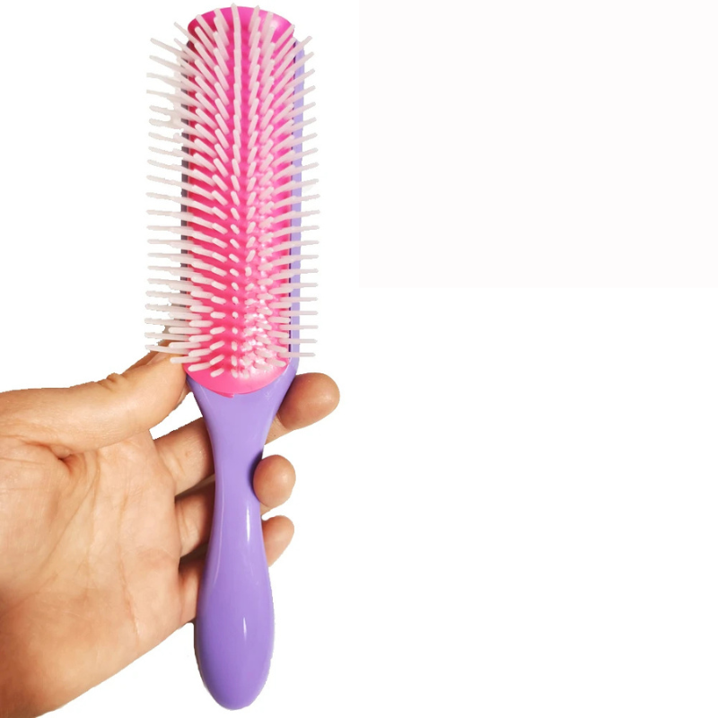 Spazzola per capelli viola e rosa con setole bianche, impugnatura ergonomica, ideale per districare e lisciare, accessorio per cura capelli.