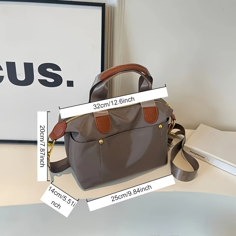 Borsa a mano in pelle marrone e tessuto grigio, dimensioni 32x20x14 cm, con tracolla regolabile. Elegante e versatile per ogni occasione.