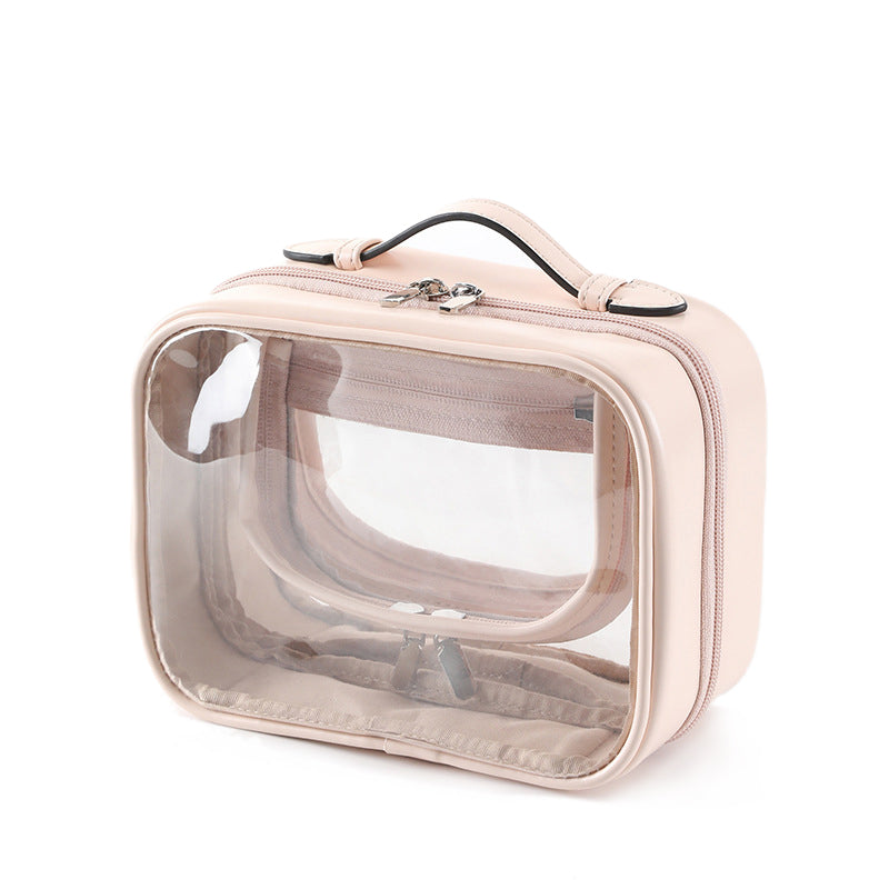 Borsa da viaggio trasparente in PVC con cerniera, manico superiore, ideale per cosmetici e articoli da toeletta, design elegante e pratico.